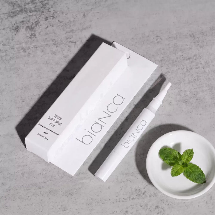 Bianca Bright whitening pen on a styled vanity