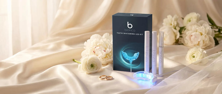 Bianca Bright LED whitening kit and pens on ivory silk with peonies and wedding bands