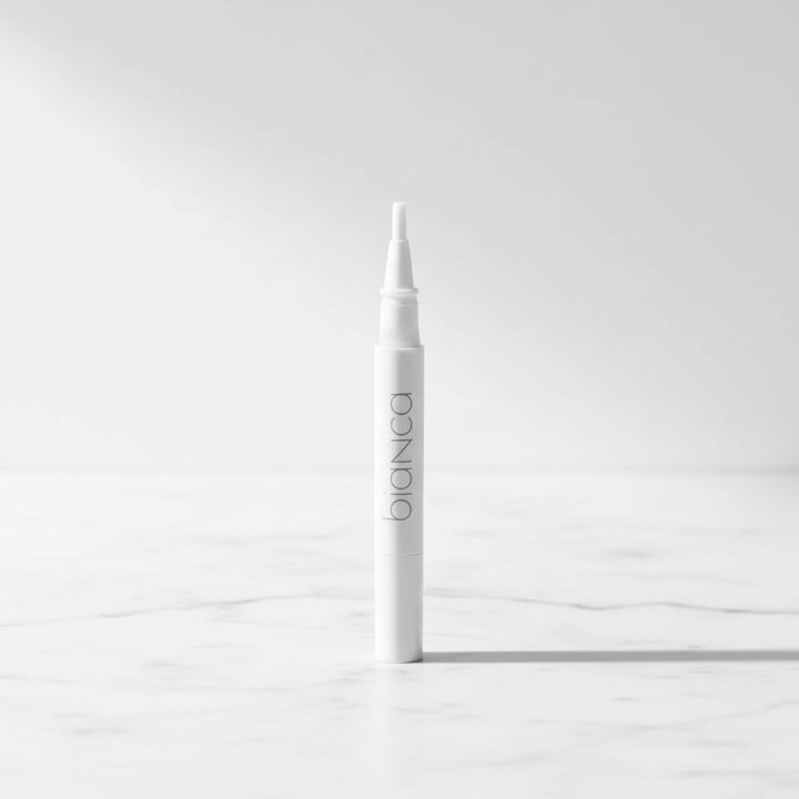 Bianca Bright whitening pen hero shot on marble