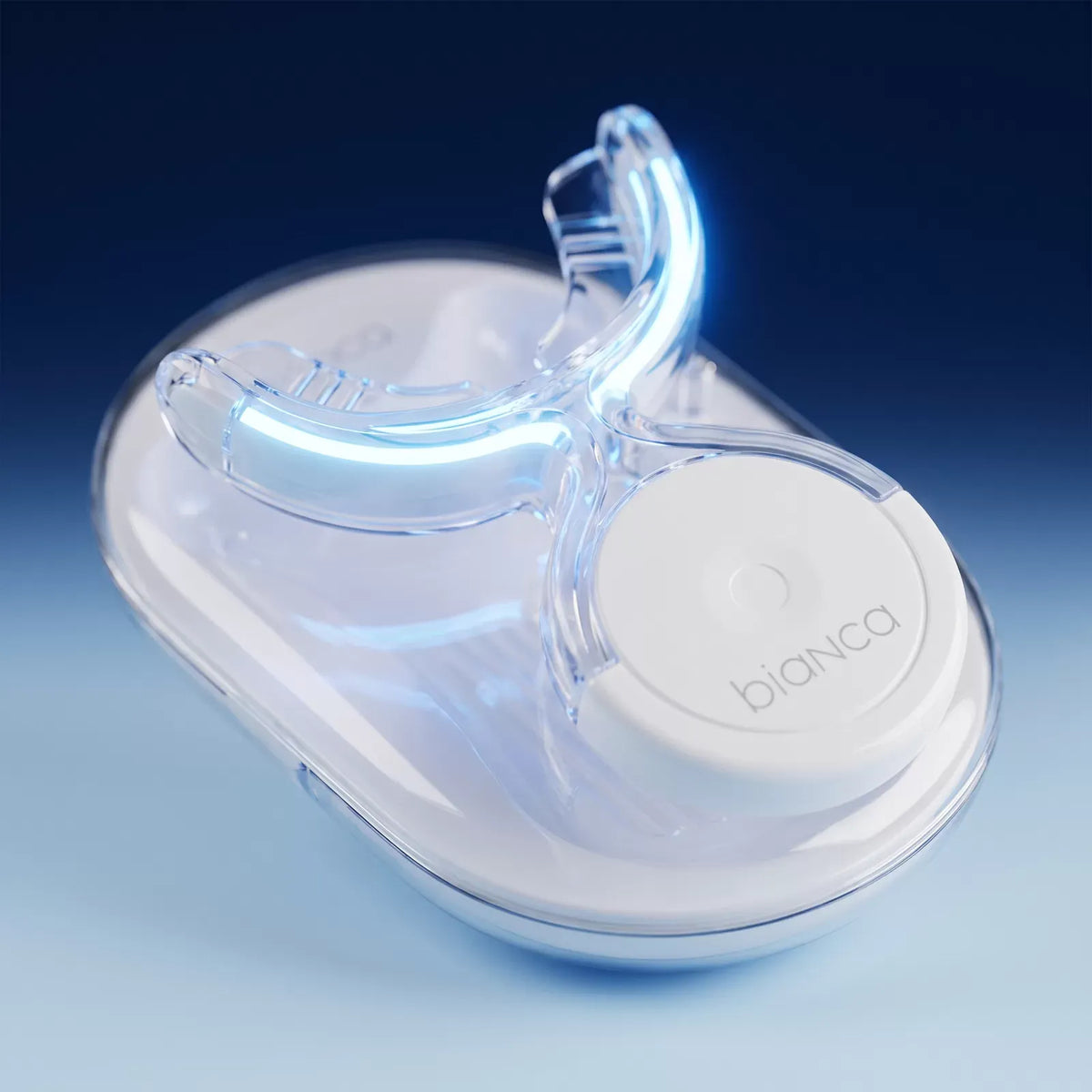 Macro of the Bianca Bright wireless LED whitening tray glowing blue on its charging case