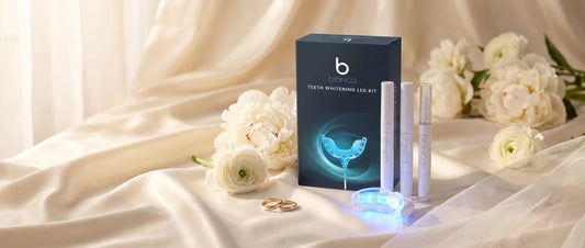 The Bridal Suite: Bianca Bright LED whitening kit and pens on ivory silk with peonies and wedding bands
